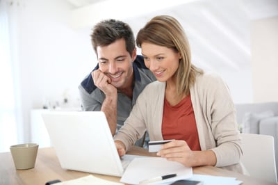 Couple at home buying on internet-1